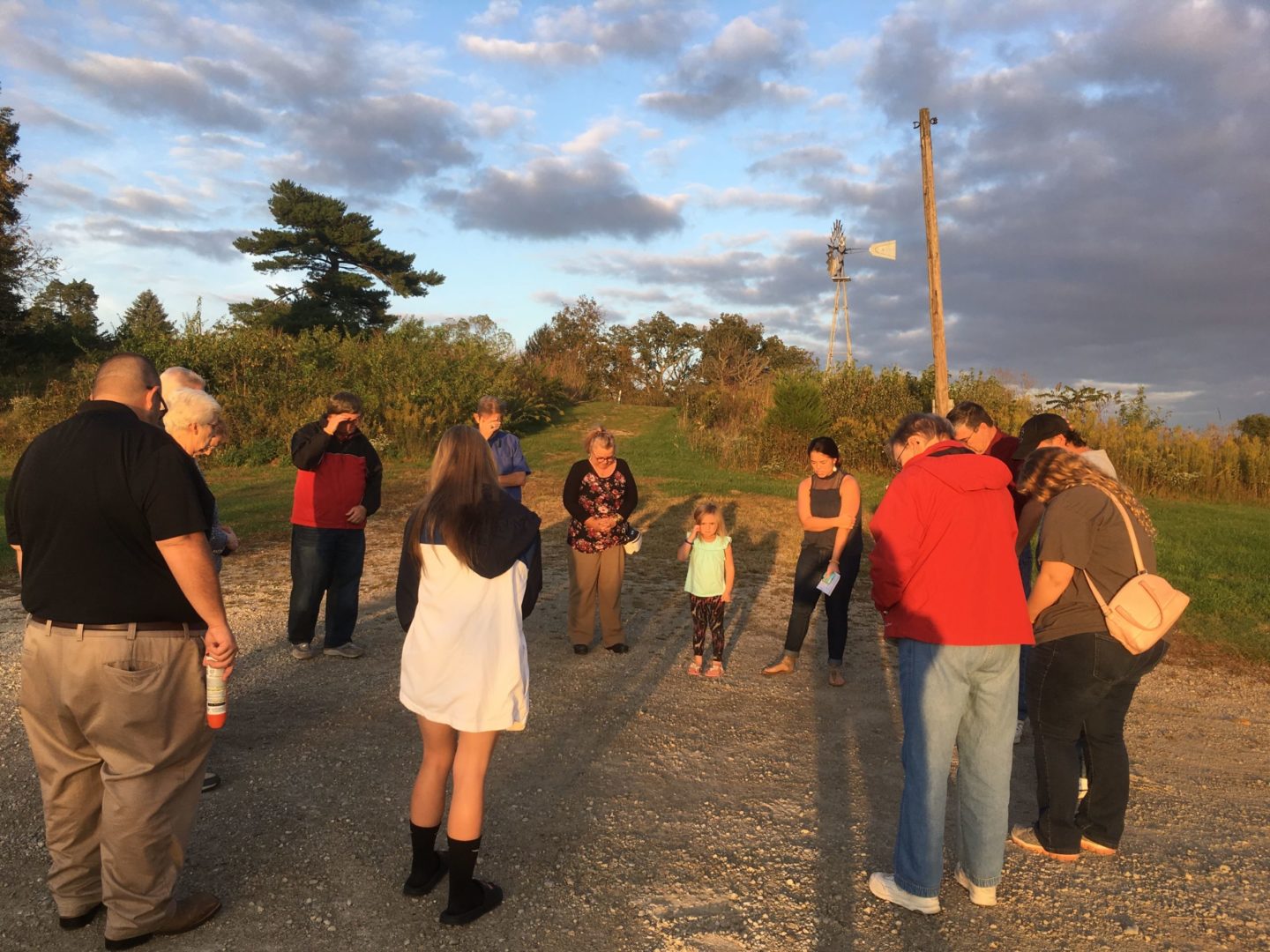 Champions praying at a host party